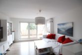 Wohnzimmer - 3 ZKB, 85m², zentrumsnah mit Terrasse, 2 kl. Balkonen u. Tiefgaragenstellplatz
