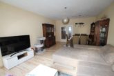 Wohnzimmer - Schönes Wohnen in Sandhausen: 3 ZKB, 91m², mit Sonnenbalkon und Tiefgaragenstellplatz